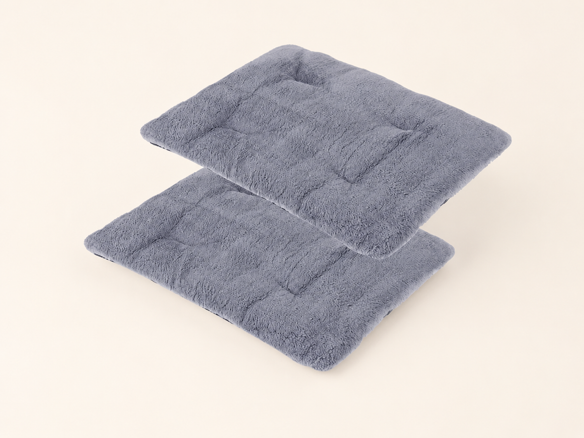 two grey self heating dog mats