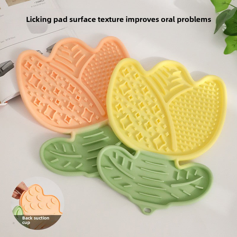Three silicone pet toys with textured surfaces on a white background.